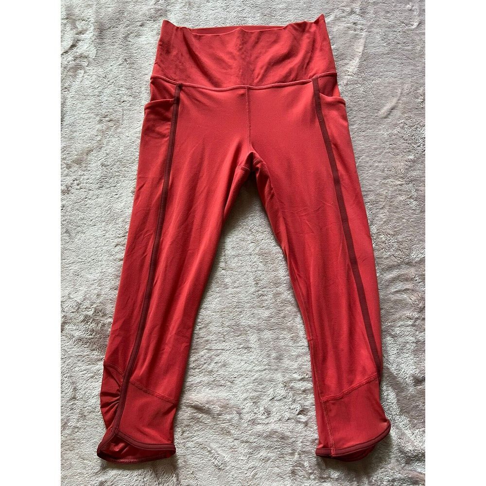 Athleta Salutation Stash Pocket Capri Mesh Lychee Red Leggings‎ Small